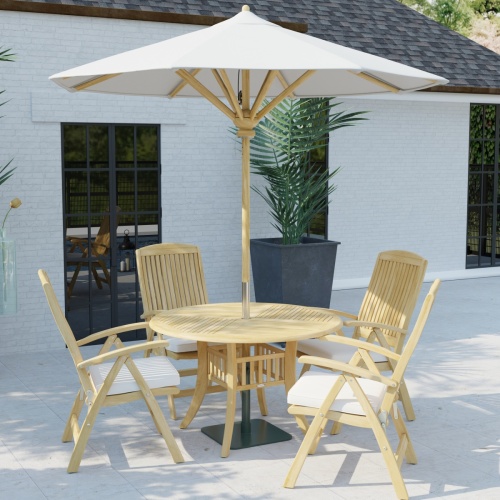 70025 Hyatt Recliner Dining Set with Seat Cushions and optional umbrella in angled side view on tiled stone patio next to a potted tree with a door and window of house in background
