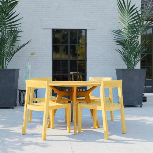 70355 Horizon Surf 5 pc Cafe Dining Set in side view on stone patio with 2 potted plants and window in the background