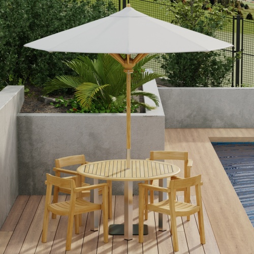 70478 Vogue Horizon Dining Set with optional opened umbrella on patio with privacy wall lined with plants next to pool in background