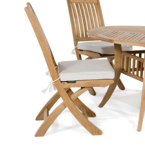 71011MTO Sunbrella Chair Cushion on teak chair on white background