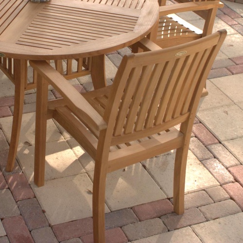 12196ST Sussex Dining Chair back view on colored stone patio