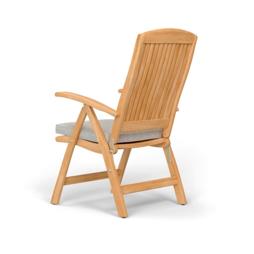 12569S Barbuda Recliner front view showing 2 on patio with optional seat cushions with trees and blue sky background