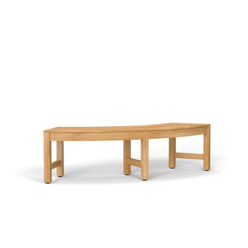13937 Buckingham Teak Backless Bench angled end view with Buckingham Dining Table with coffee pot and cups a potted plants on rock outdoor patio with trees and ocean in background