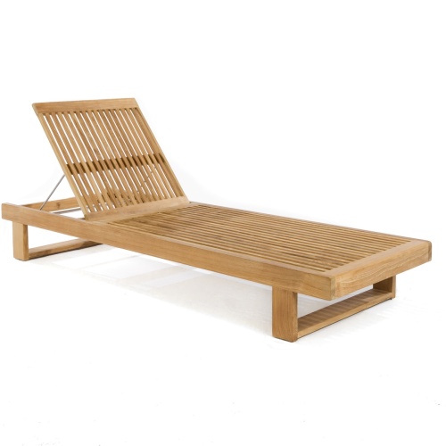 16770DP Horizon teak Chaise Lounger with optional cushion and neckrolls showing 2 loungers with sun hat and 2 teak side tables with bottle sparkling water overlooking the ocean
