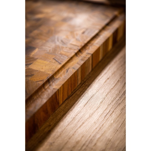 19123 Butcher Block 17 inch x 11 inch Rectangle Charcuterie Cutting Board angled on a table top