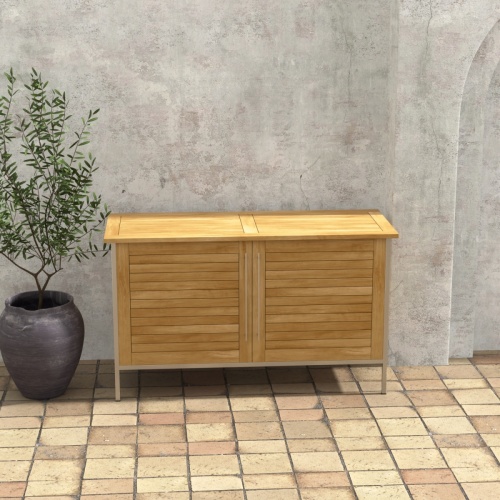 28226 Vogue Teak and Stainless Steel Beverage Console in front view next to a potted plant on tiled outdoor patio with a house in the background