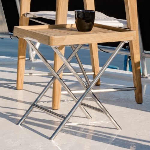 28815dp odyssey ottoman with serving tray on boat deck