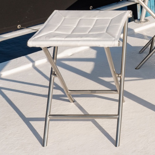 28815F Odyssey Folding Ottoman angled side view on boat deck