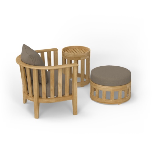 70257 Kafelonia 3 pc Chair & Ottoman Set of Kafelonia Club Chair and Ottoman and Side Table with removable tray in angled front view on patio with lake and trees in background