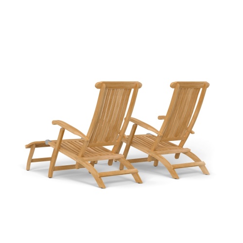 70511 Barbuda Double Steamer Set with optional neckroll and cushions angled on grass lawn with trees in background