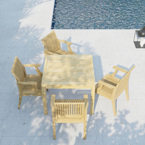 70555 Laguna 5 pc Square Dining Set of Bistro 36 inch Square Teak Dining Table and 4 Laguna Dining Armchairs in aerial view on pool deck with pool in the background 