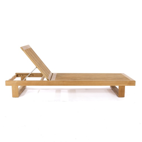 16770DP Horizon teak Chaise Lounger with optional cushion showing 6 in aerial angled view facing pool with building and trees in background