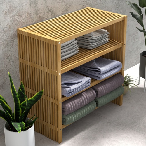 18220 Teak Storage Shelf with towels folded on the 3 shelves in aerial angled front view next to 3 potted plants against a wall