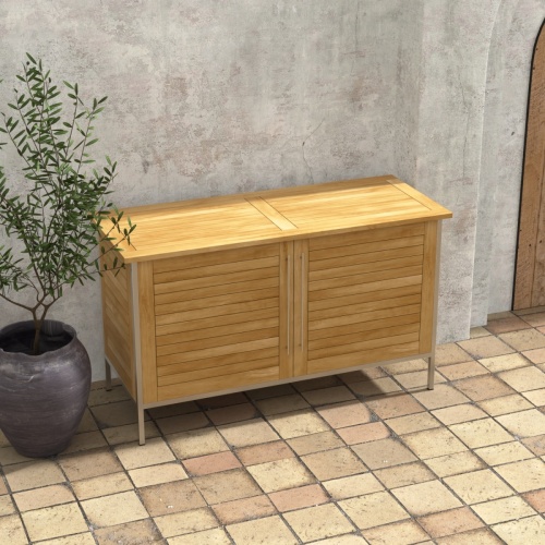 28226 Vogue Teak and Stainless Steel Beverage Console aerial angled view next to a potted plant on tiled outdoor patio with a house and door in the background