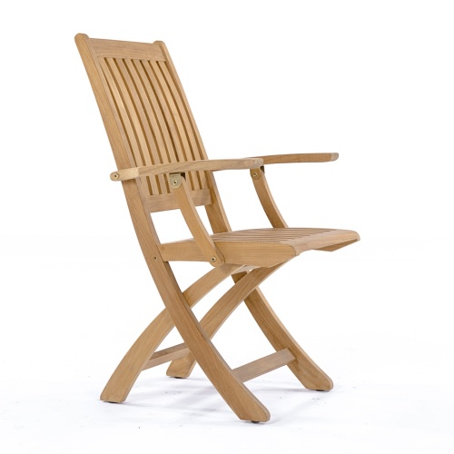 70048 Nevis Barbuda teak Dining Set with optional seat cushions in angled side view on terrace with glass doors of home in background