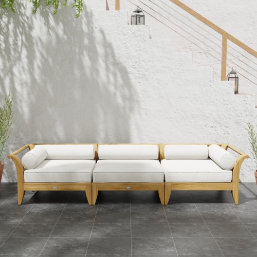 70102 Aman Dais 3 pc Sofa Set of 2 Aman Dais Corner Sectional and End Sectional in front view against a staircase of house with lanterns on steps next to a potted plant