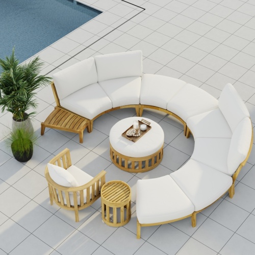 70940 Kafelonia 6 piece Sofa Sectional Set in aerial view on outdoor tiled patio next to 2 potted plants and in front of a pool