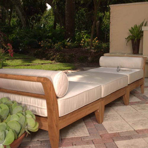 70103 Aman Dais 3 piece teak set of 2 Aman Dais End Sectionals and Ottoman in angled side view on white background 