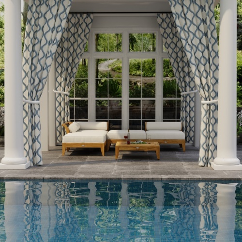 70281 Aman Dais 4 pc Lounge Sofa Set of one corner one end sectionals and two ottomans front view facing pool showing drapes and glass windows in background