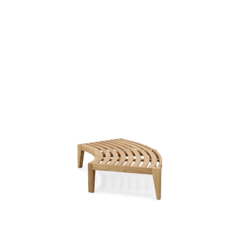 13342DP Kafelonia Backless Curved Sofa Sectional with optional cushion front view on outdoor patio with landscape grass and ocean n background