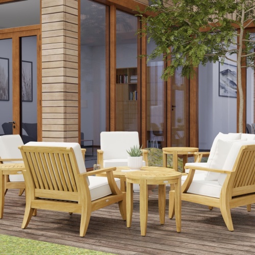 70106 laguna eleven piece lounge set with succulent plant in white pot on center of coffee table on wood deck with house and windows and tree in background