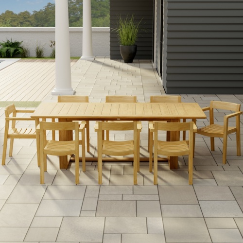 70220 Horizon teak Dining Set cushioned water pitcher three sparkling water bottles plate of limes on outdoor balcony with vegetation three palm trees beach house and ocean background 