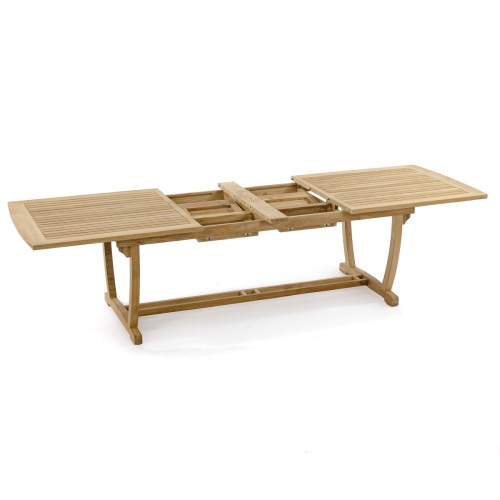 25025 Vogue Teak and Stainless Steel102 inch Rectangular Extension Dining Table in angled side view showing double butterfly leaves in table storage area on white background