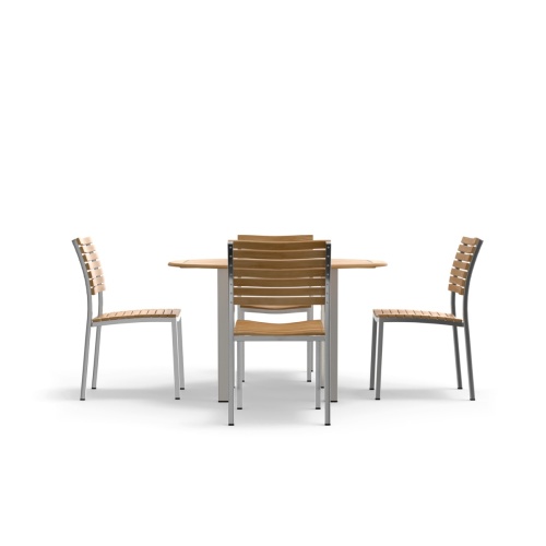 70438 Vogue Dining Set for 4 of Vogue Teak and Stainless Steel 48 inch Round Dining Table and 4 Vogue Side Dining Chairs in angled side view on white background