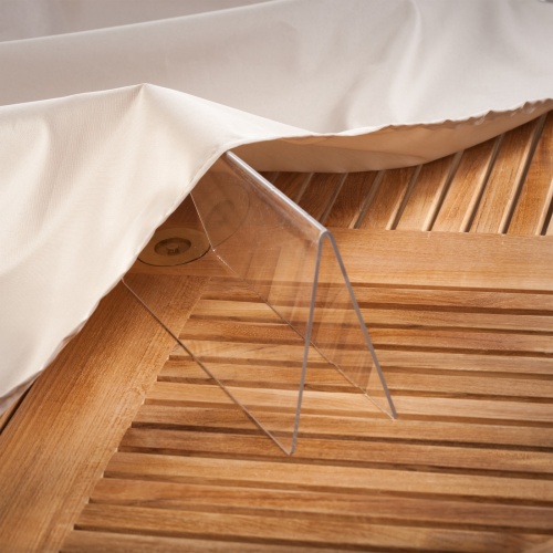 65867 Barbuda Table in Opened Position Cover closeup of hem on teak table