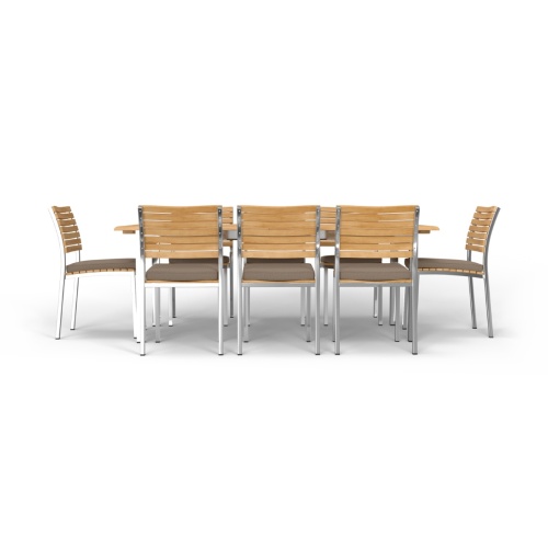 70756 Vogue 7 pc Dining Set of 6 Vogue Stacking Dining Chairs with optional seat cushions and Vogue Rectangular Dining Table in side profile view on white background