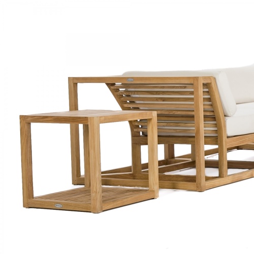 70233 Maya Deep Seating 7 Piece Teak Sectional Sofa Set with Cushions and teak side table closeup side view on white background