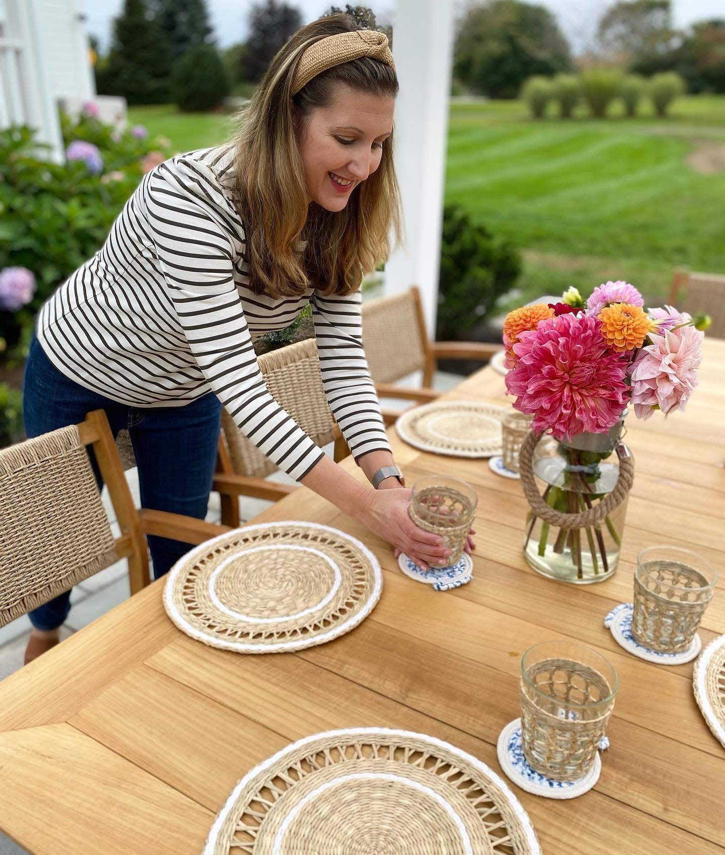Roula Rallis from Sewcialite arranging a table setting on a Horizon Table