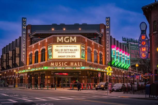An  image of the MGM Music Hall next to Fenway Stadium at night in Boston’s entertainment district.